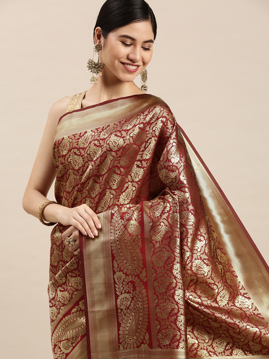 

Hinayat Fashion Maroon Ethnic Motifs Zari Silk Blend Banarasi Saree