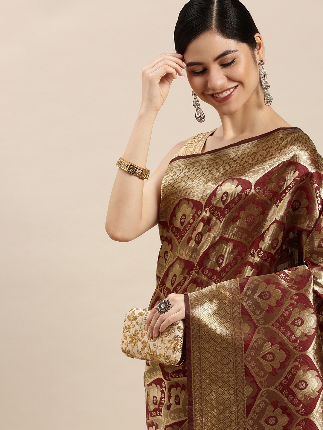 

Hinayat Fashion Maroon Ethnic Motifs Zari Silk Blend Banarasi Saree