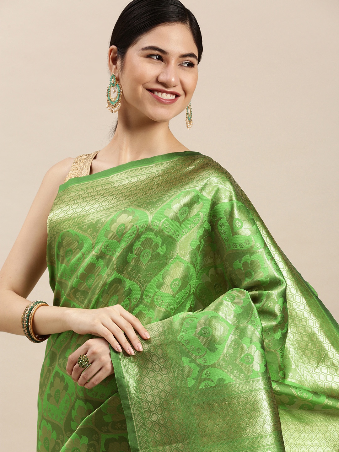 

Hinayat Fashion Lime Green & Golden Woven Design Zari Saree