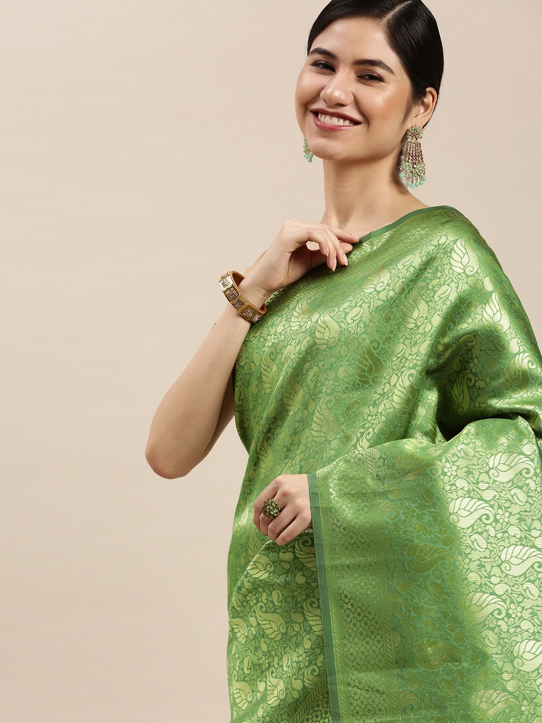 

Hinayat Fashion Lime Green & Golden Woven Design Zari Saree