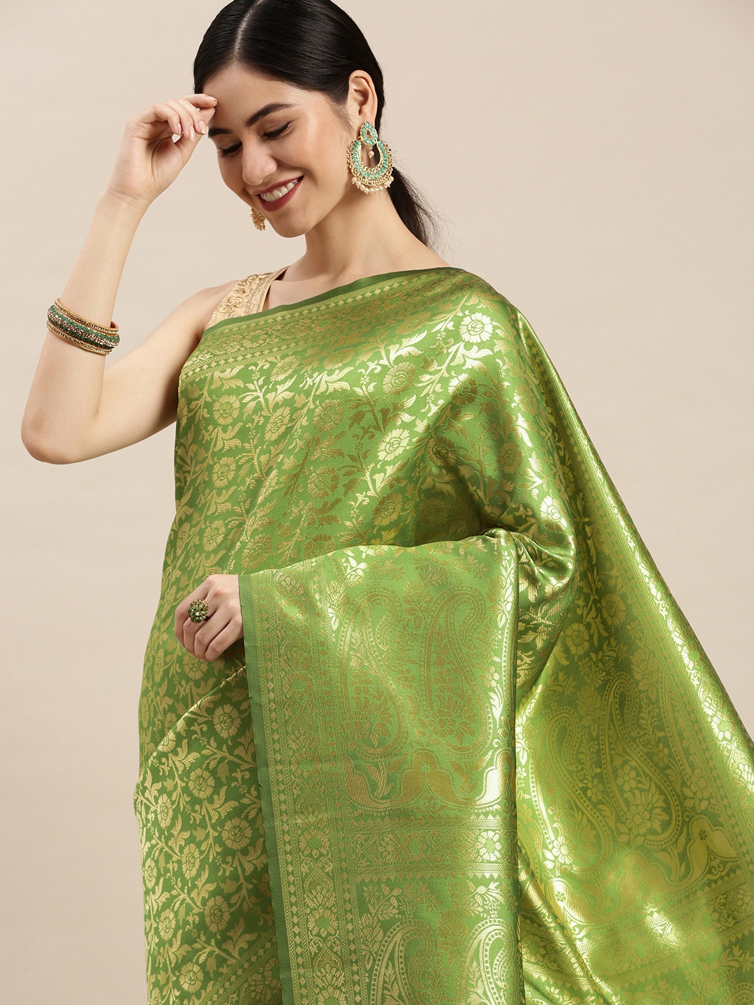 

Hinayat Fashion Lime Green & Golden Woven Design Zari Saree