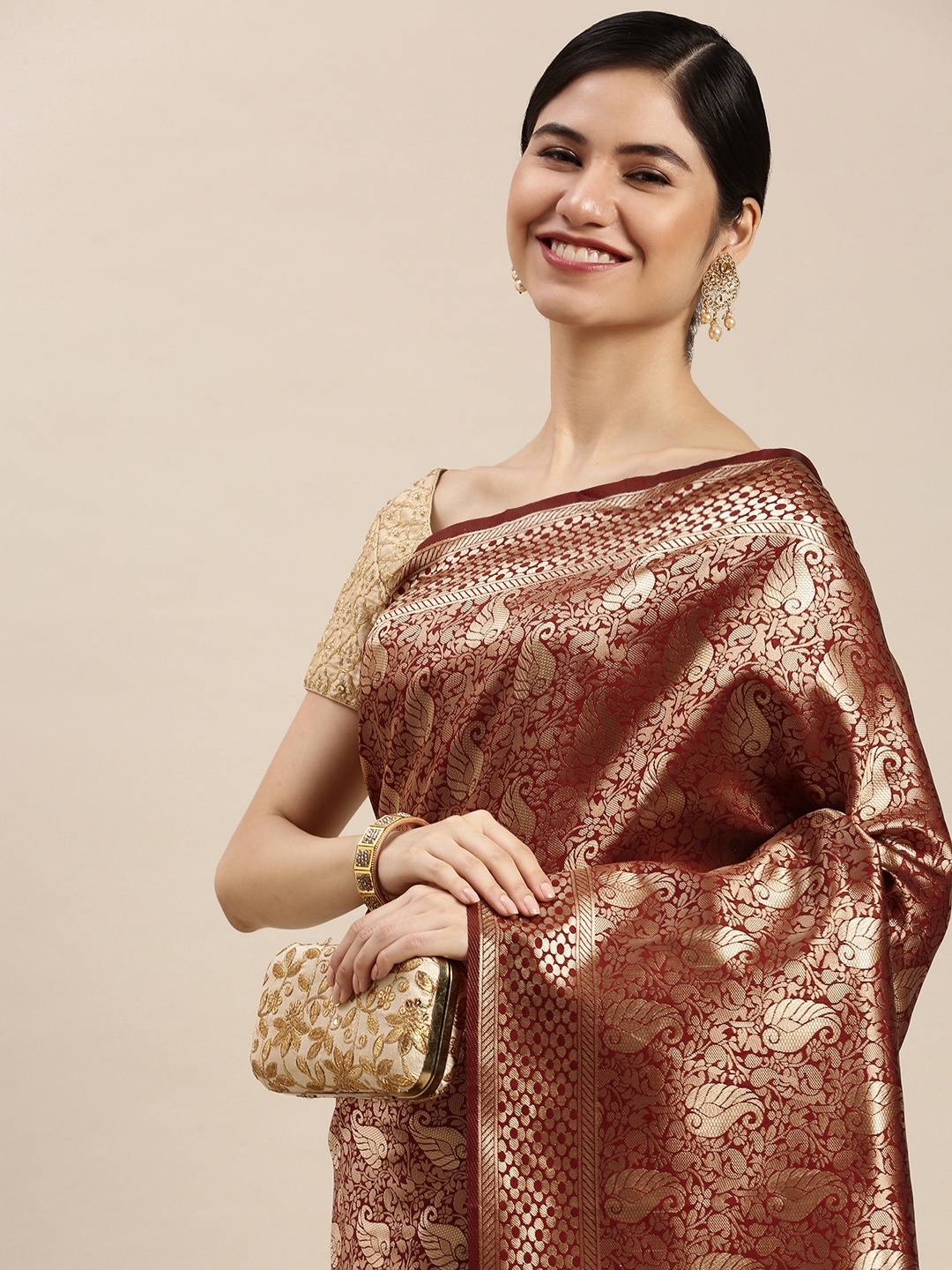 

Hinayat Fashion Maroon & Golden Woven Design Zari Saree