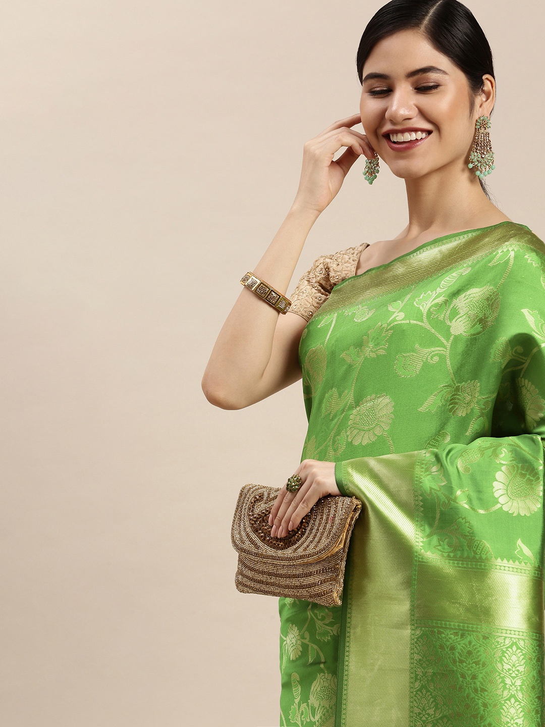 

Hinayat Fashion Lime Green & Golden Woven Design Zari Saree