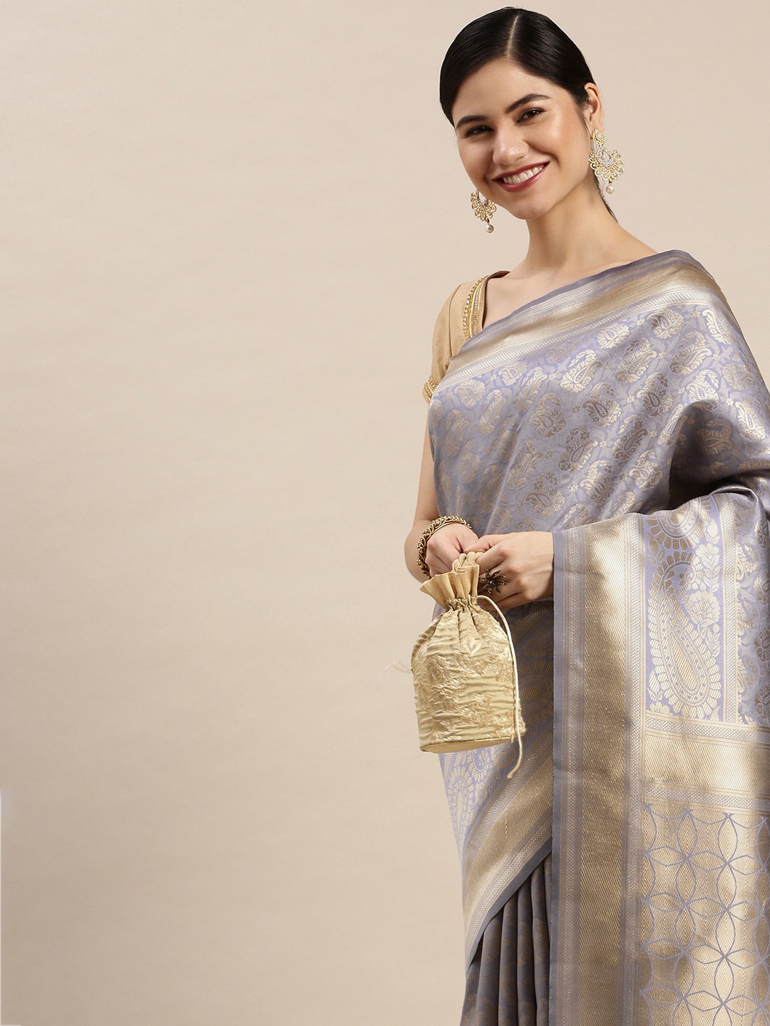 

Hinayat Fashion Lavender & Golden Woven Design Zari Saree