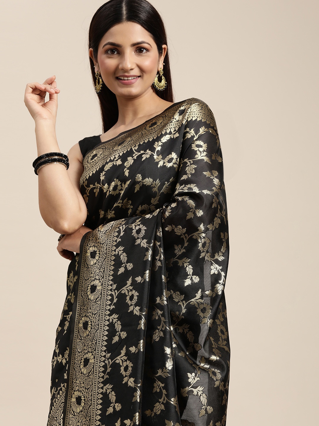 

Hinayat Fashion Black & Golden Ethnic Motifs Zari Silk Blend Saree