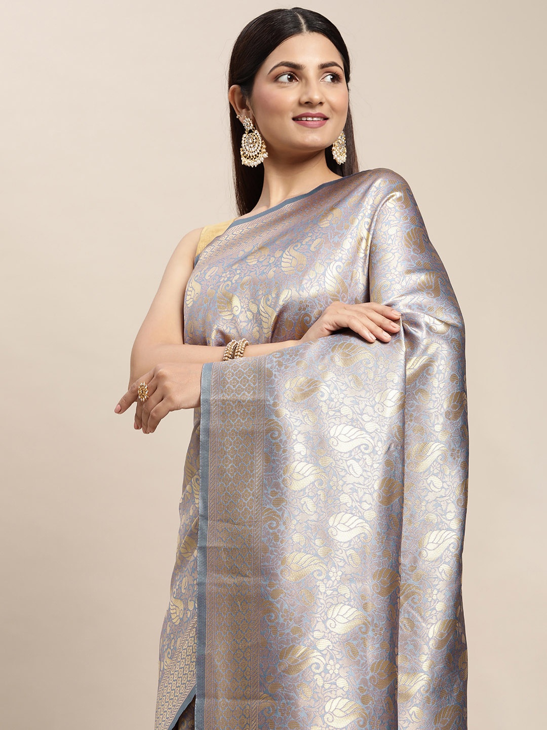 

Hinayat Fashion Lavender & Golden Ethnic Motifs Zari Saree