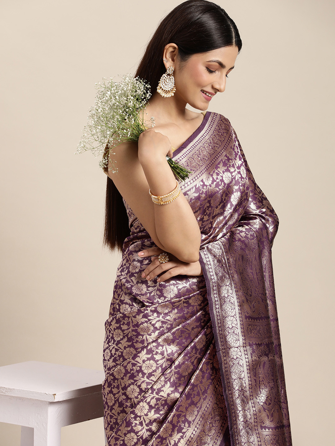 

Hinayat Fashion Purple & Golden Woven Design Zari Silk Blend Saree