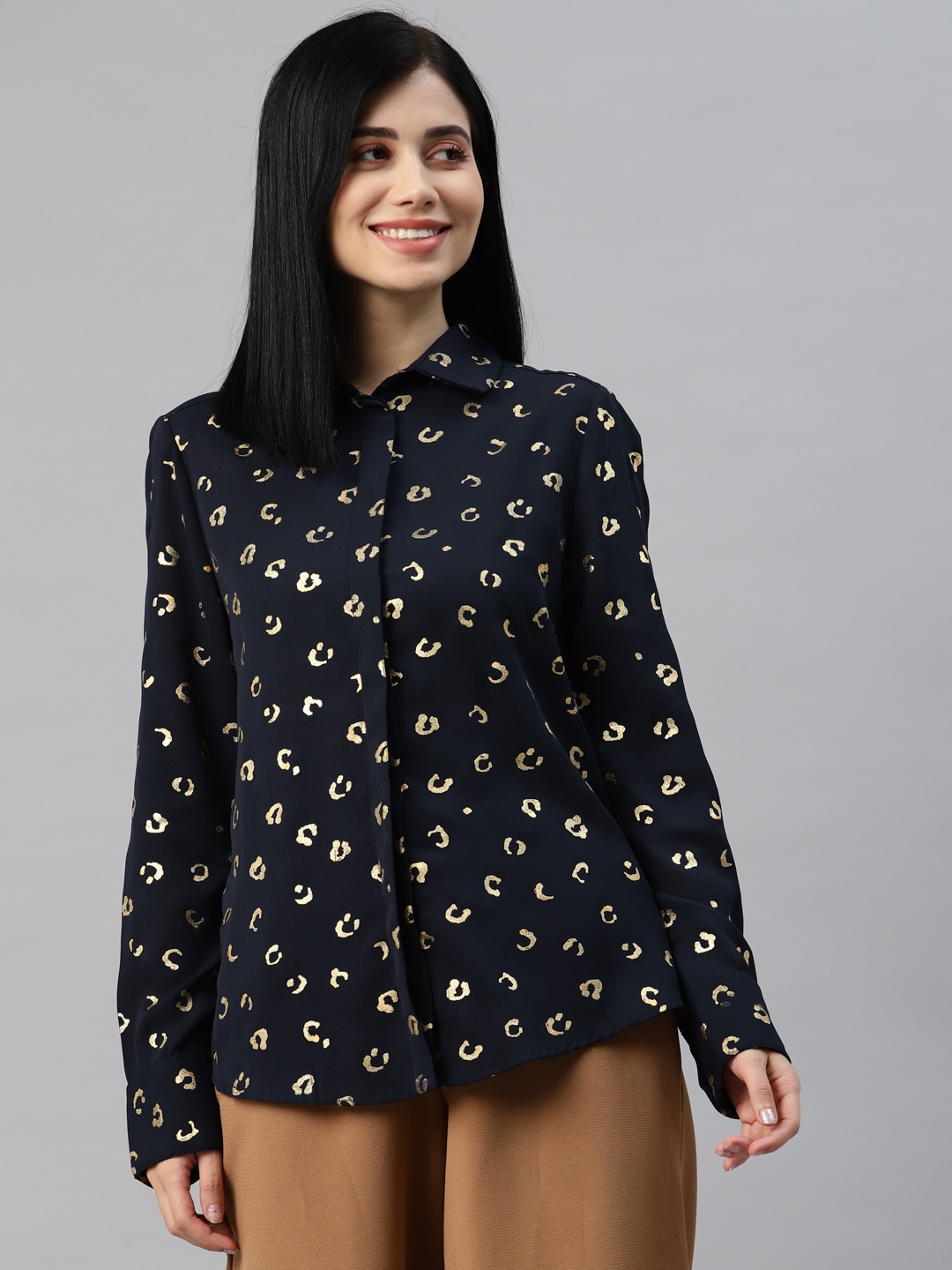 

Marks & Spencer Navy Blue & Golden Animal Print Shirt Style Top