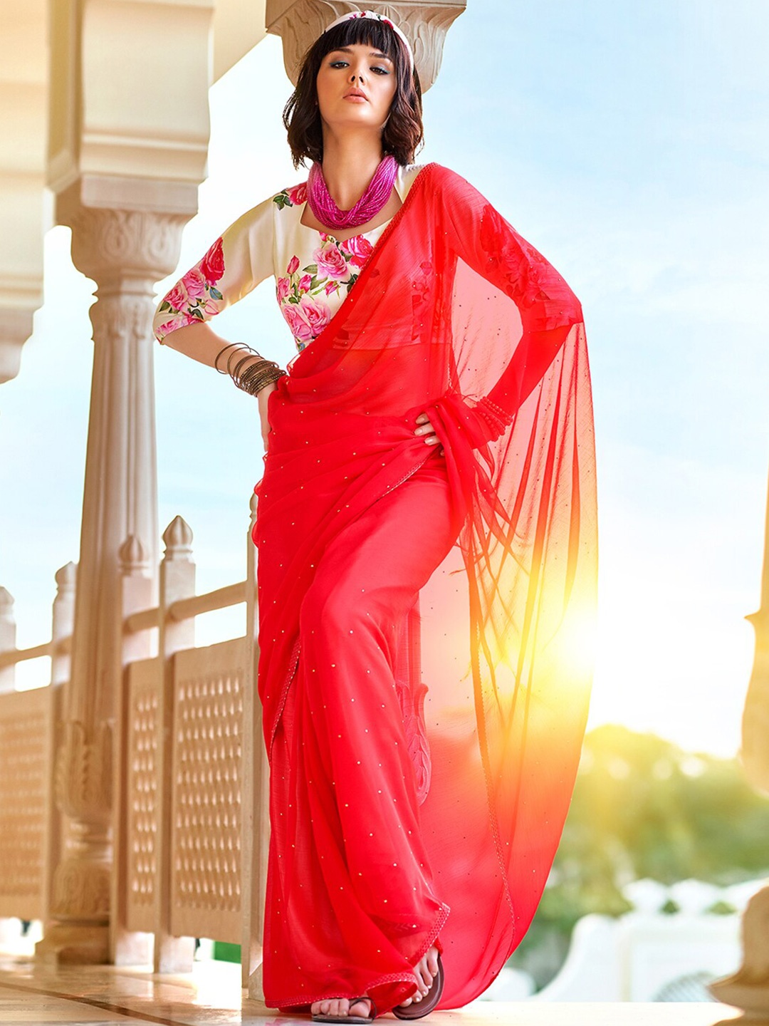 

Shaily Coral Embellished Beads and Stones Pure Chiffon Saree