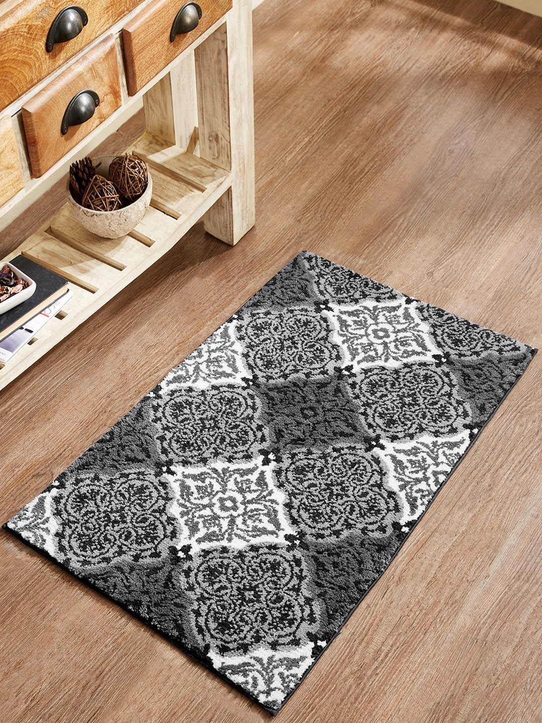 

Pano Charcoal Grey & White Ethnic Motifs Patterned Anti Skid Bath Rugs