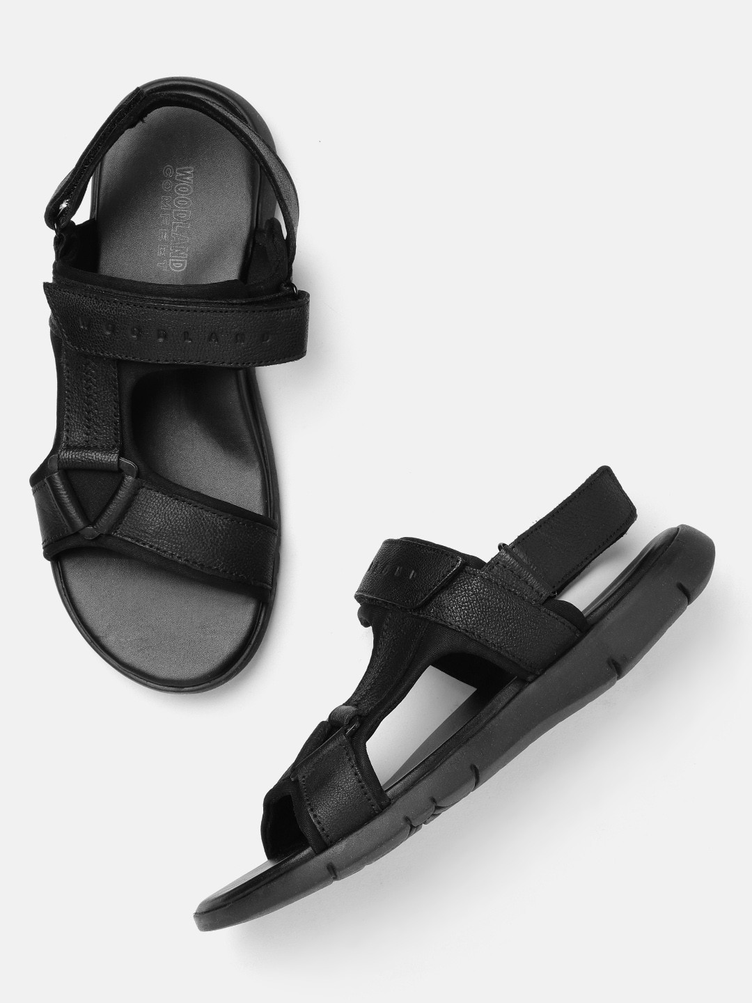 

Woodland Men Black Solid Leather Comfort Sandals