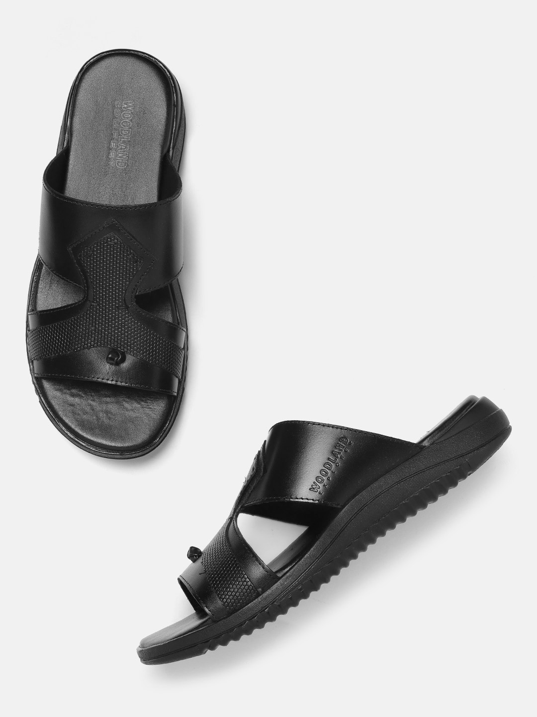 

Woodland Men Black Solid Leather Comfort Sandals