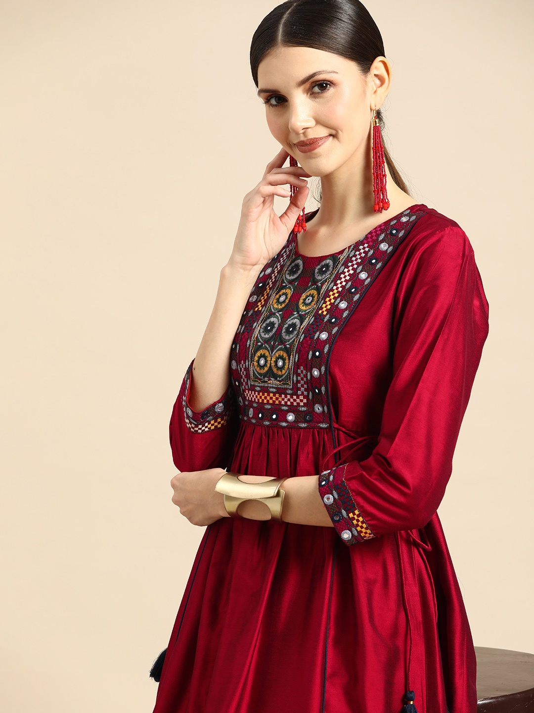 

Sangria Women Red Ethnic Motifs Yoke Design Mirror Work Kurta with Palazzos