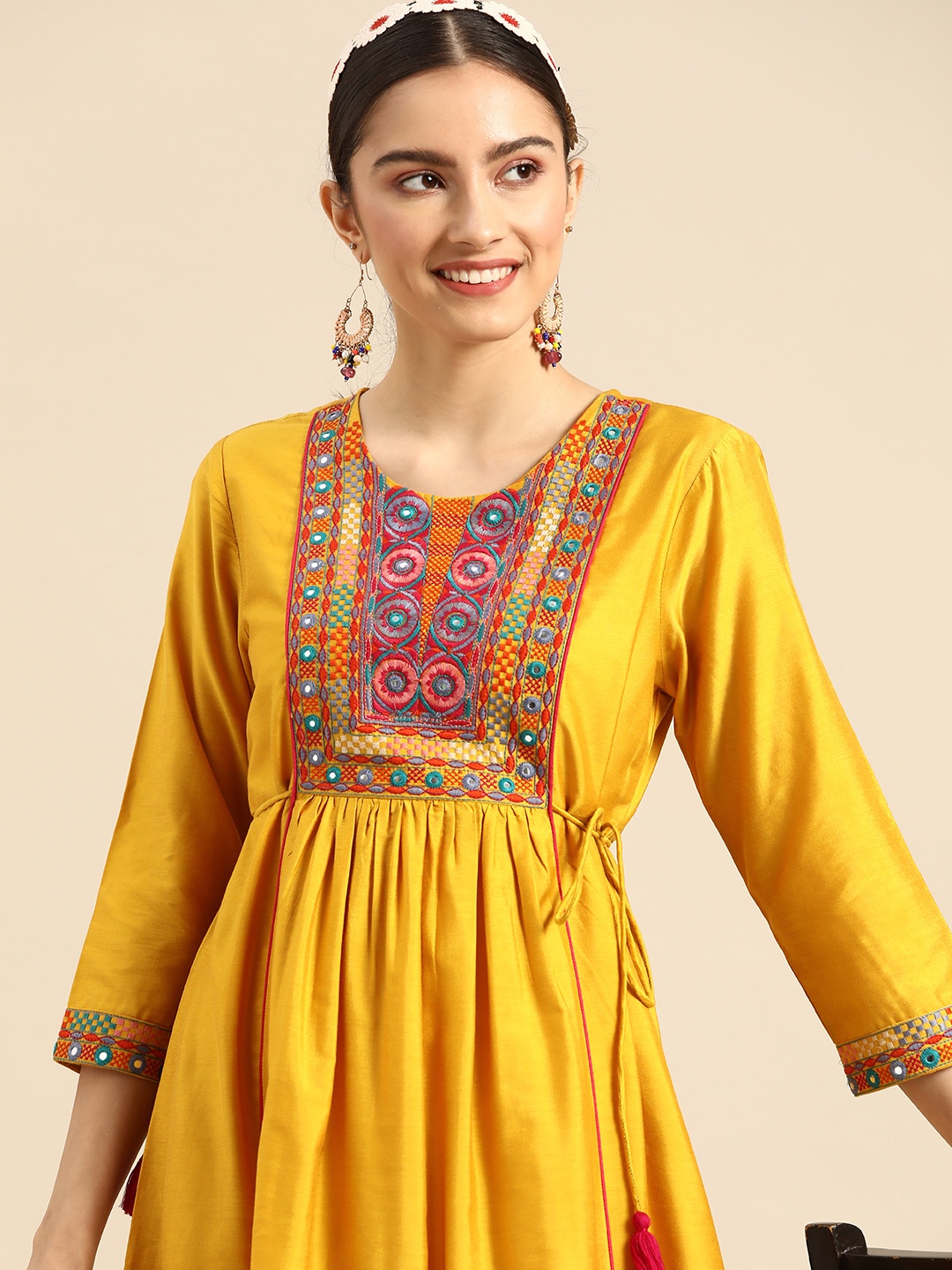 

Sangria Women Yellow Yoke Design Pleated Mirror Work Kurta with Trousers