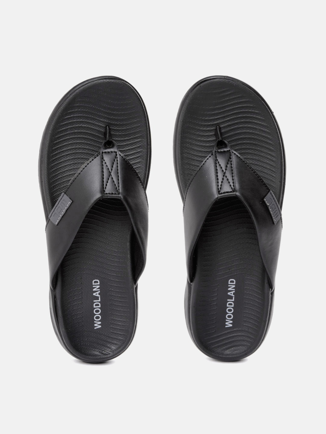 

Woodland Men Black Solid Thong Flip-Flops
