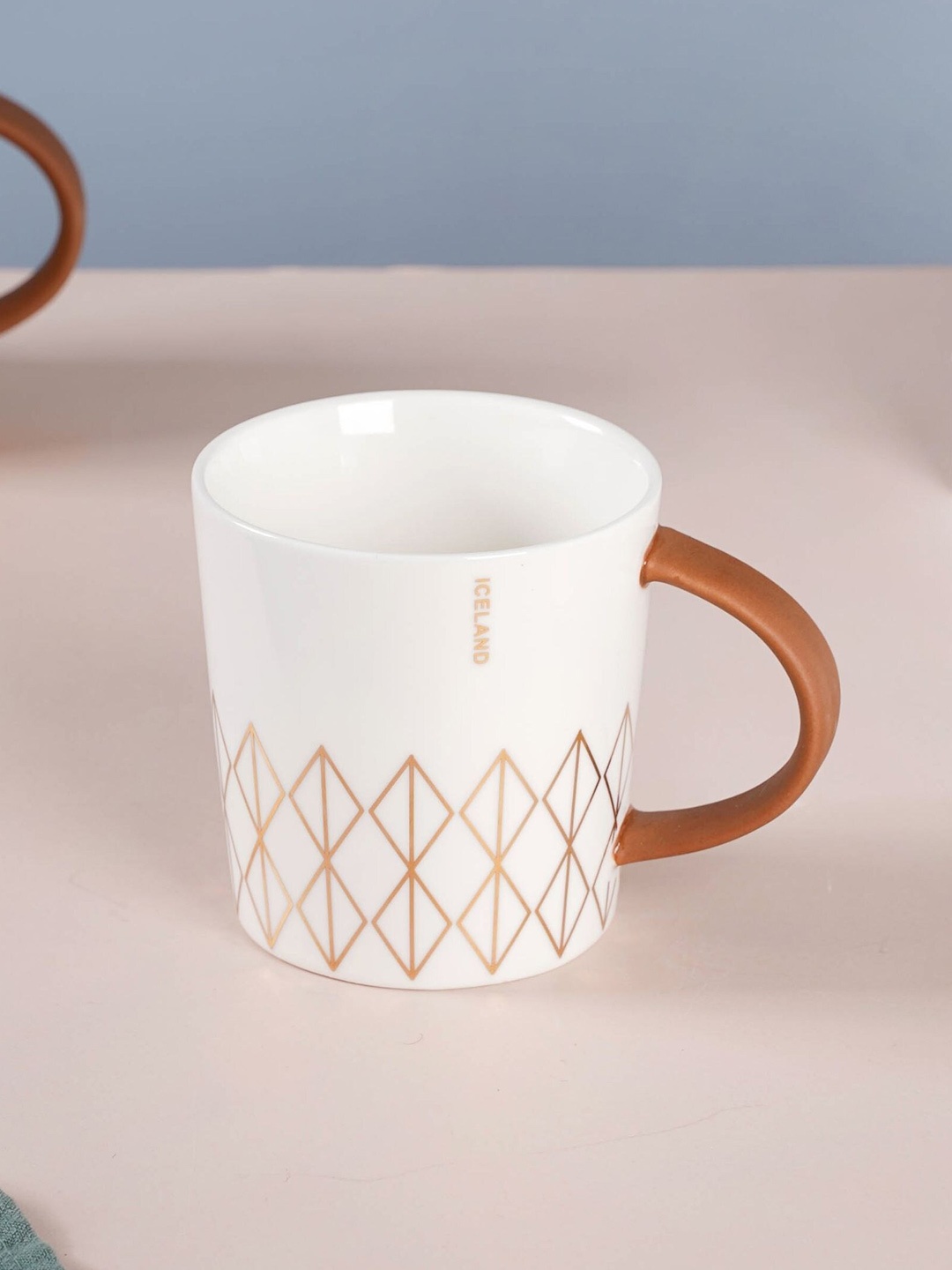 

Nestasia White & Brown 1 Piece Printed Ceramic Glossy Mug