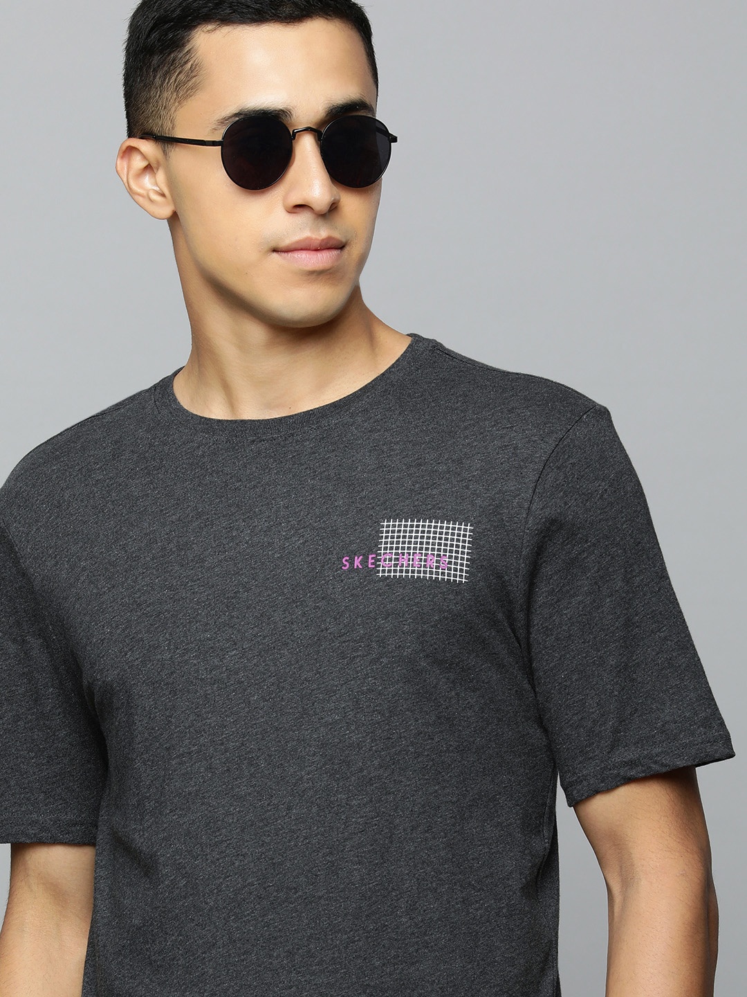

Skechers Men Charcoal Solid Pure Cotton T-shirt