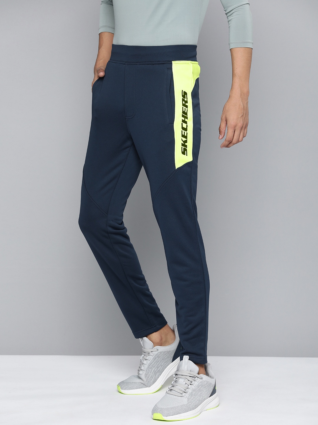 

Skechers Men Regular Fit Mid-Rise Colourblocked Skechtech Track Pants, Navy blue