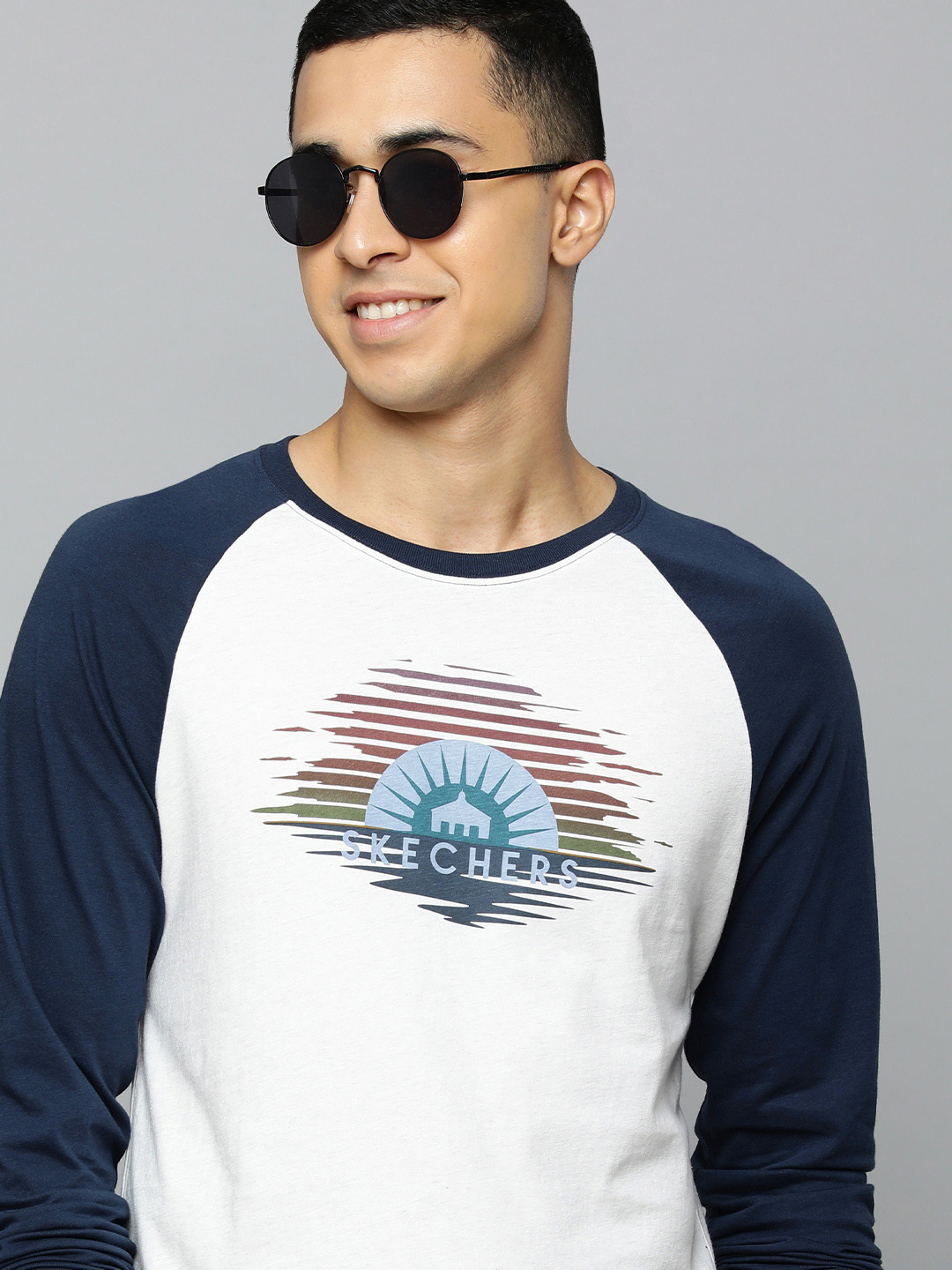 

Skechers Men Off White & Navy Blue Typography Printed Pure Cotton T-shirt