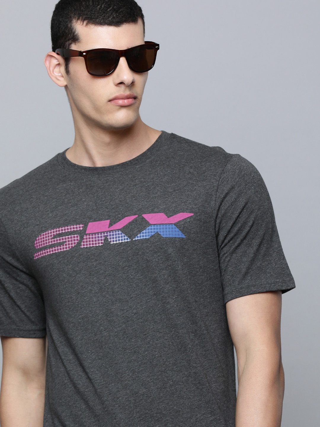 

Skechers Men Charcoal Black Brand Logo Printed Pure Cotton T-shirt