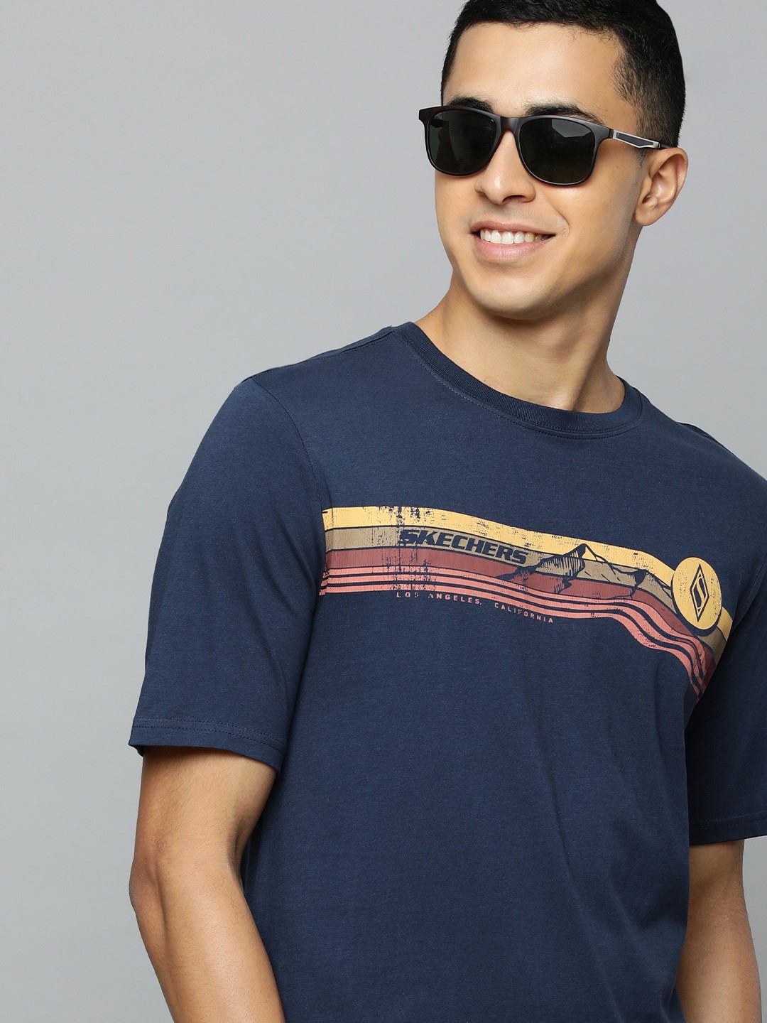 

Skechers Men Blue Brand Logo Printed T-shirt