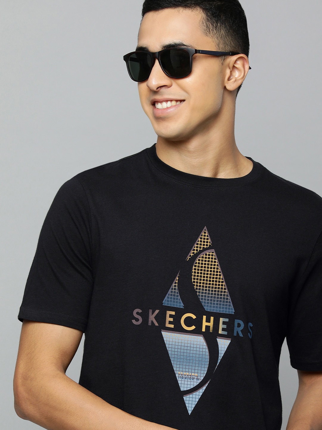 

Skechers Men Black Brand Logo Printed Pure Cotton T-shirt
