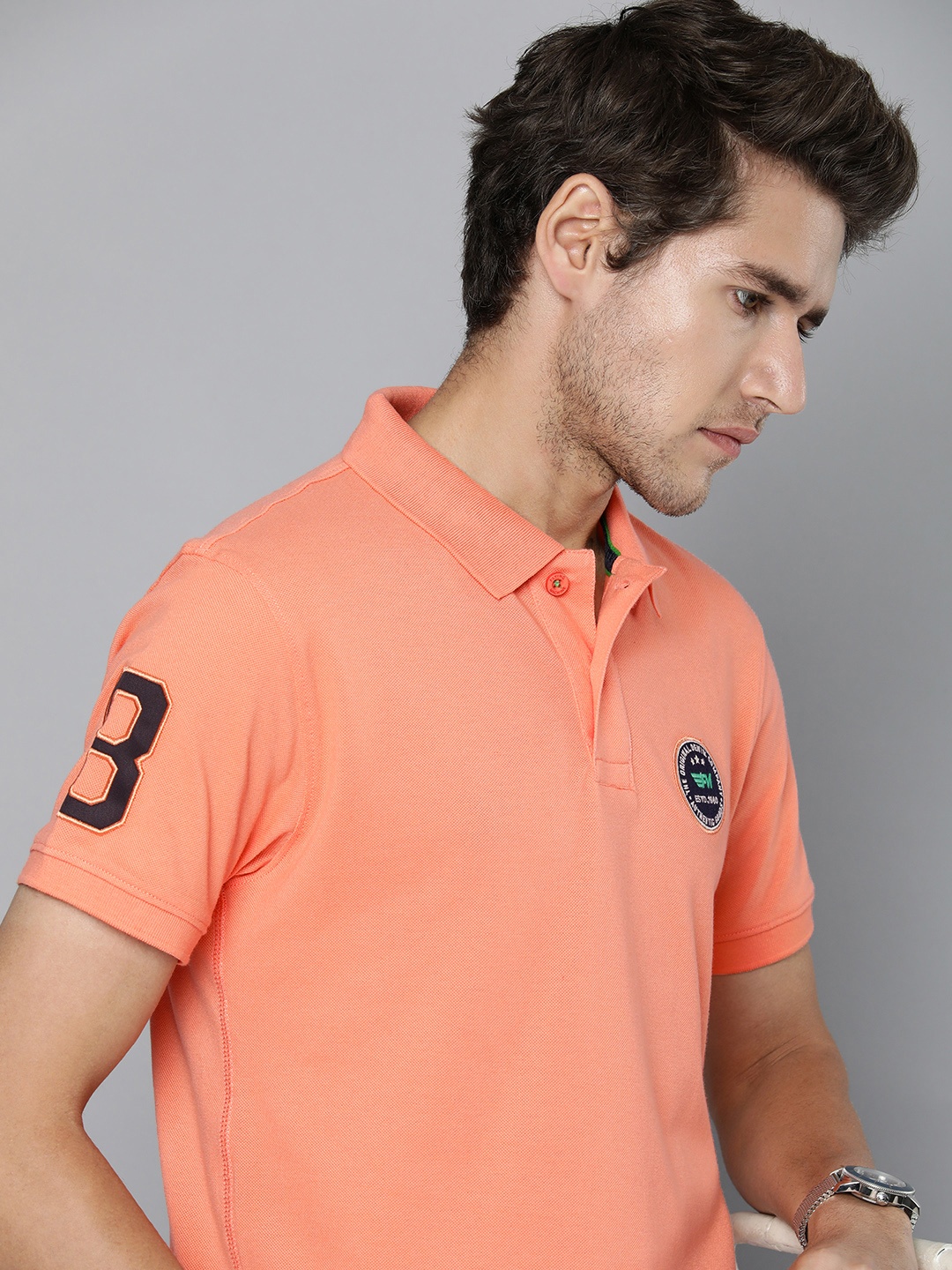 

Flying Machine Men Orange Solid Polo Collar Applique T-shirt