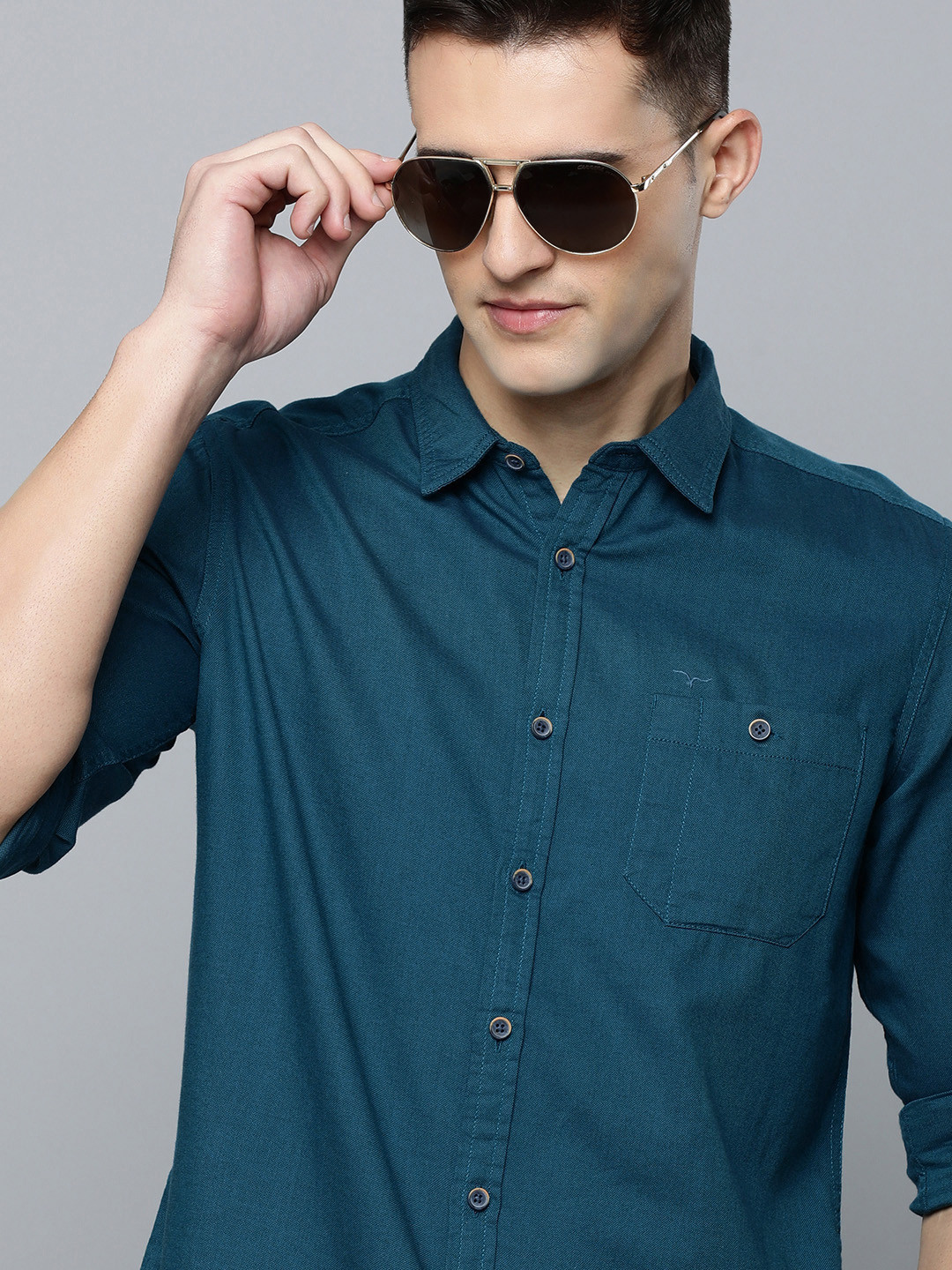 

Flying Machine Men Teal Blue Solid Pure Cotton Slim Fit Casual Shirt