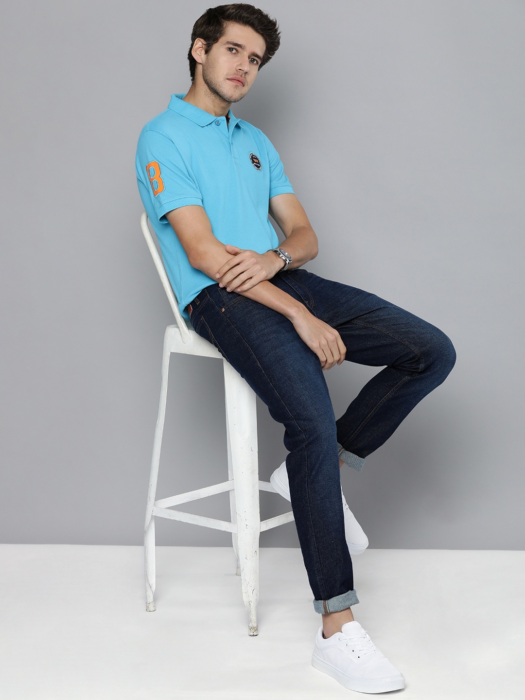 

Flying Machine Men Blue Solid Polo Collar Applique T-shirt