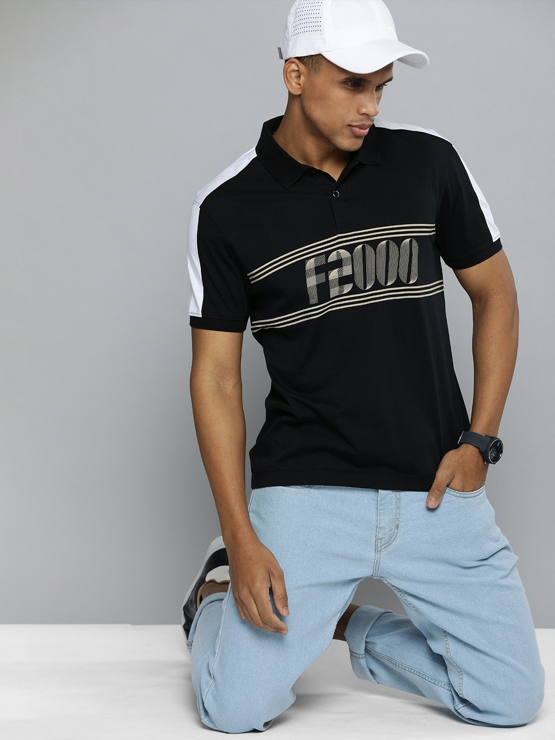 

Flying Machine Men Black Striped Polo Collar Pure Cotton T-shirt