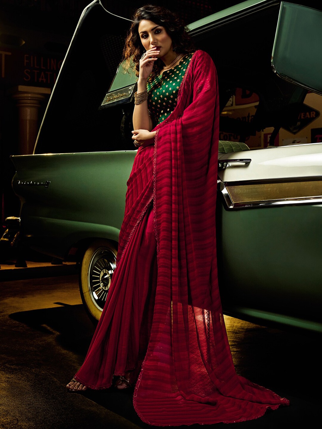 

Shaily Maroon & Green Striped Sequinned Pure Chiffon Saree With unstitched blouse piece
