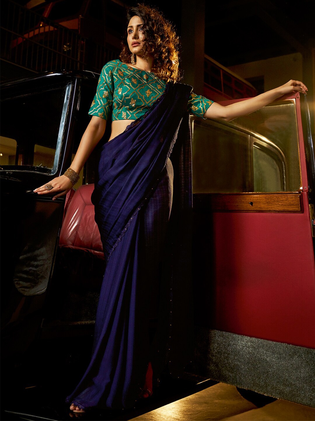 

Shaily Navy Blue & Green Striped Beads and Stones Pure Chiffon Saree