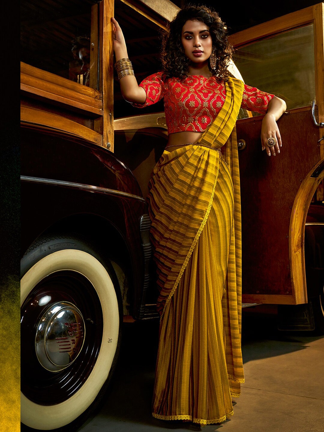 

Shaily Mustard & Red Striped Beads and Stones Pure Chiffon Saree