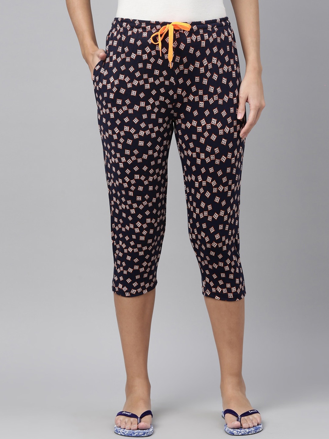 

Kryptic Women Navy Blue & Brown Printed Capris