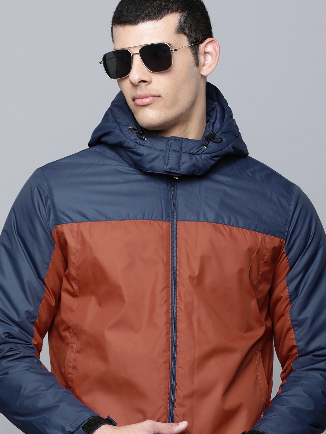 

Flying Machine Men Red & Navy Blue Colourblocked Puffer Jacket