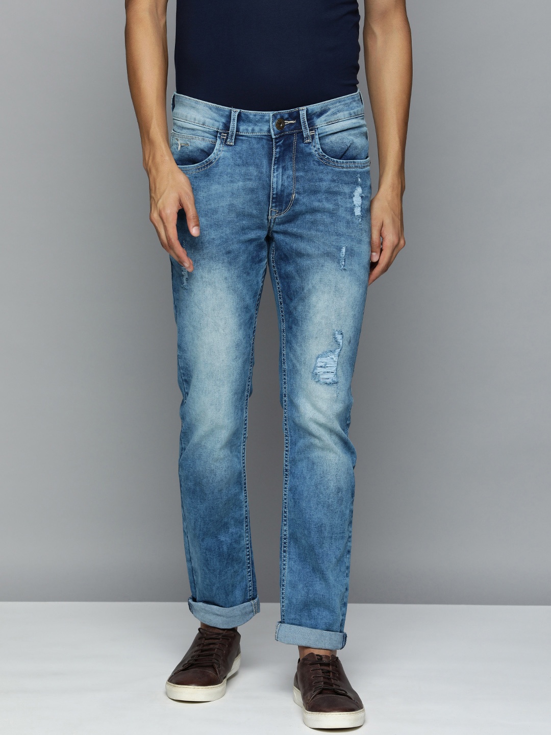

Flying Machine Men Blue Slim Fit Mildly Distressed Heavy Fade Stretchable Jeans