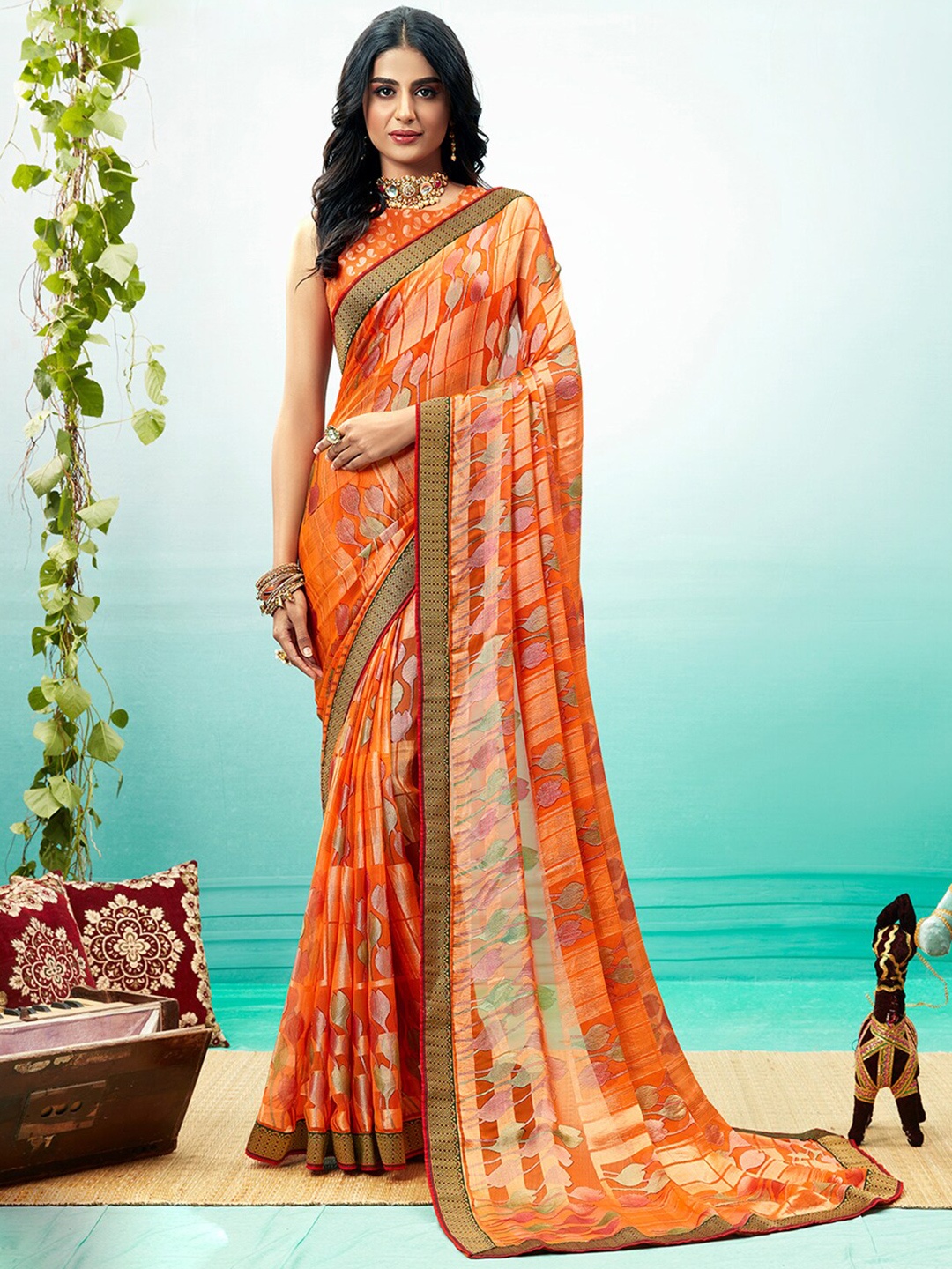 

Shaily Orange & Maroon Floral Brasso Saree