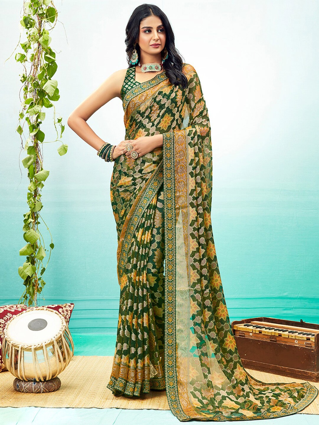 

Shaily Green & Yellow Floral Brasso Saree