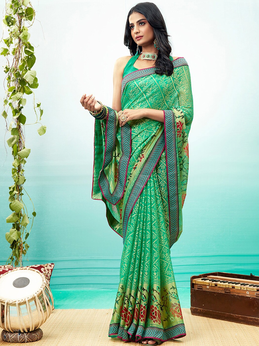 

Shaily Sea Green & Red Floral Brasso Saree