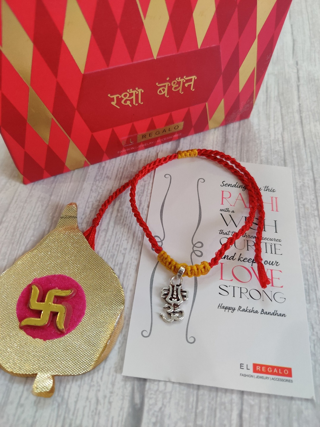

EL REGALO 925 Pure Silver Rakhi for Brother with Rakhi Card and Roli Chawal Shagun