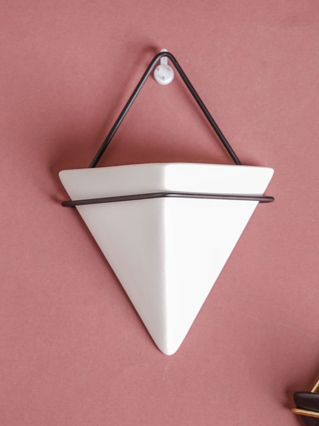 

Nestasia White & Black Solid Ceramic Wall Hanging Planter