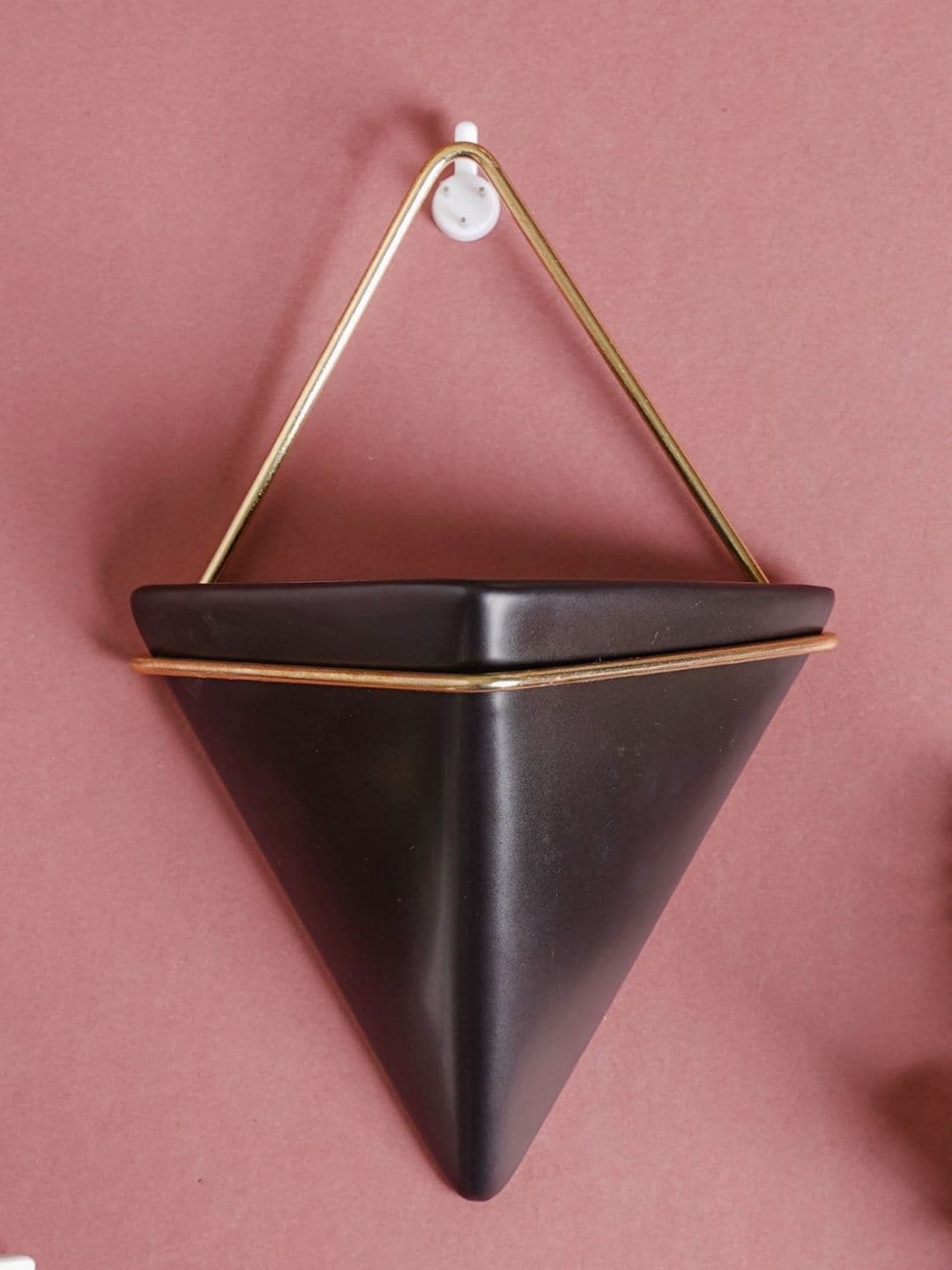 

Nestasia Gold-Toned & Black Solid Triangular Ceramic Wall Hanging