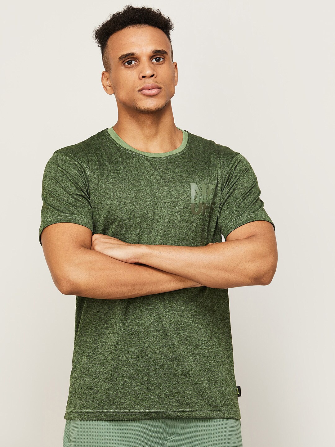 

Fame Forever by Lifestyle Men Green Solid Polyester T-shirt