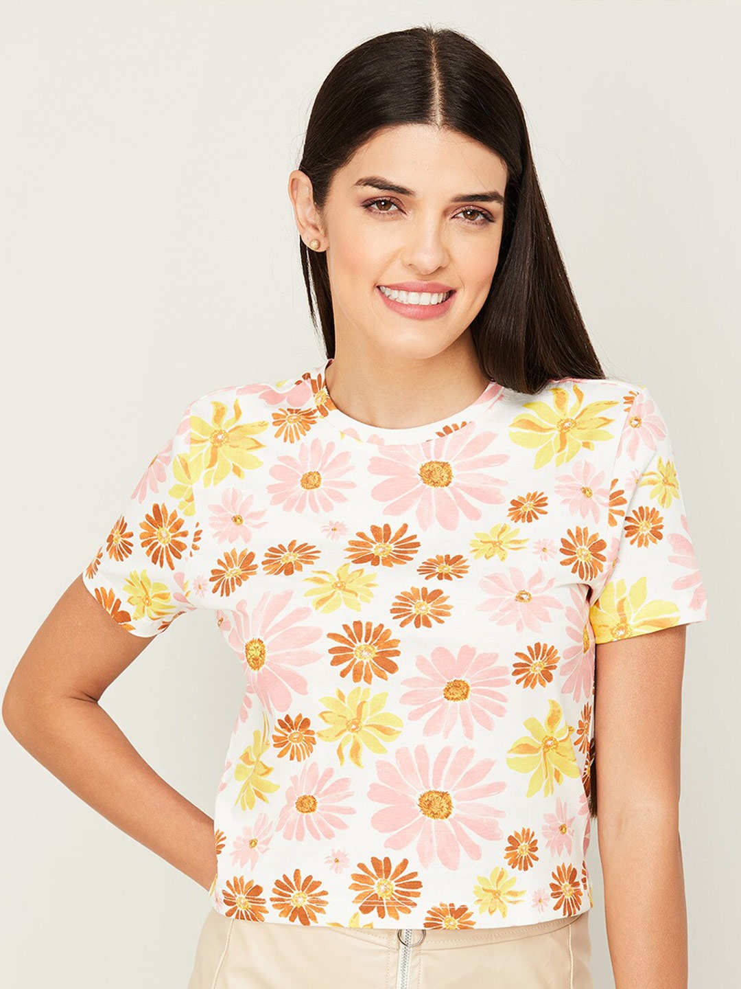 

Ginger by Lifestyle Women White & Orange Floral Printed T-shirt