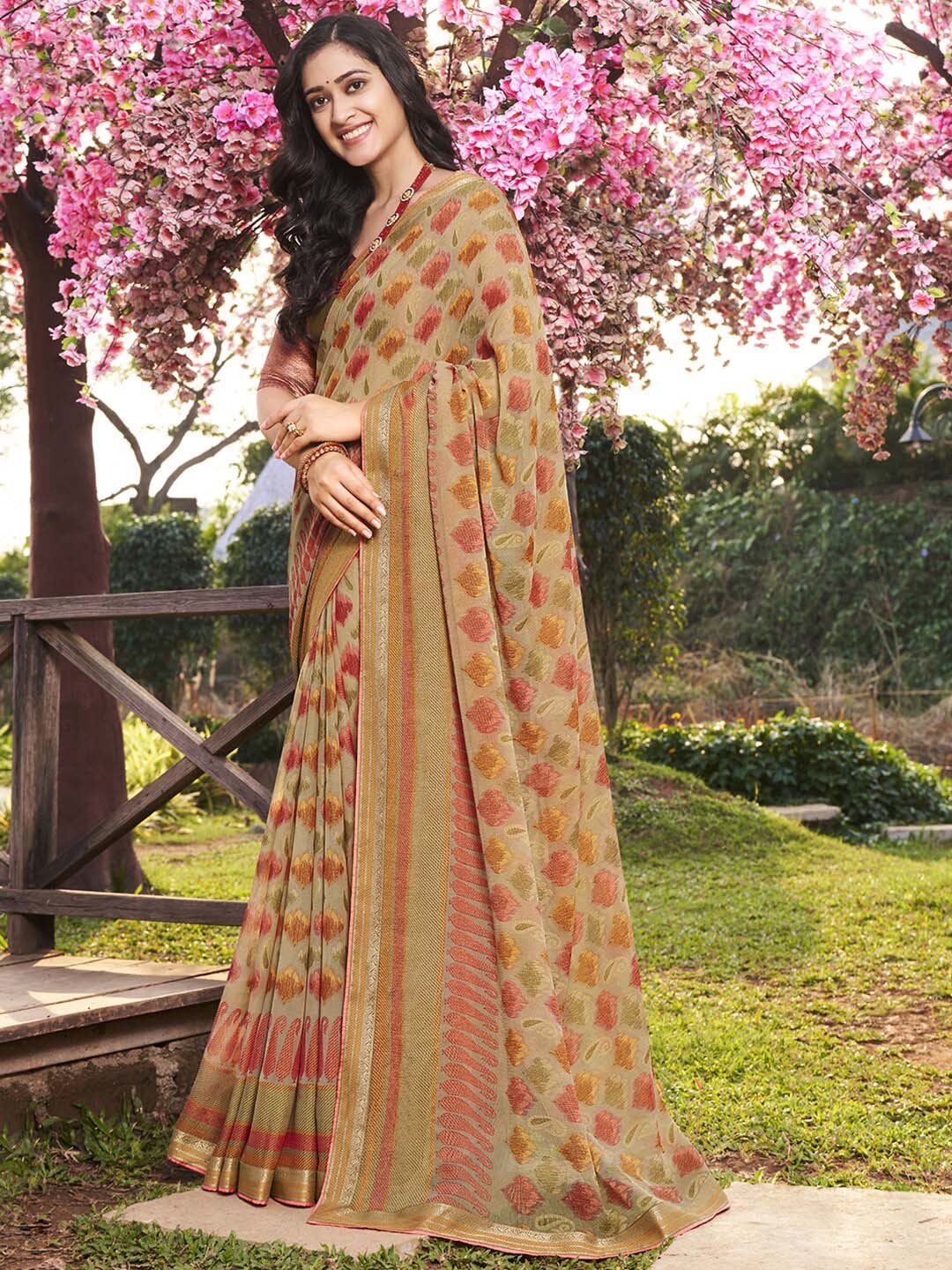 

Shaily Beige & Red Ethnic Motifs Brasso Saree