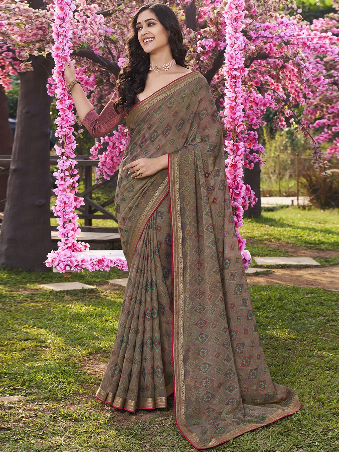 

Shaily Grey & Green Ethnic Motifs Brasso Saree