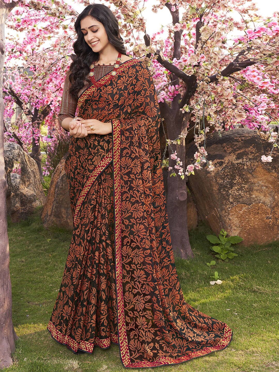 

Shaily Black & Brown Floral Brasso Saree with Printed Border