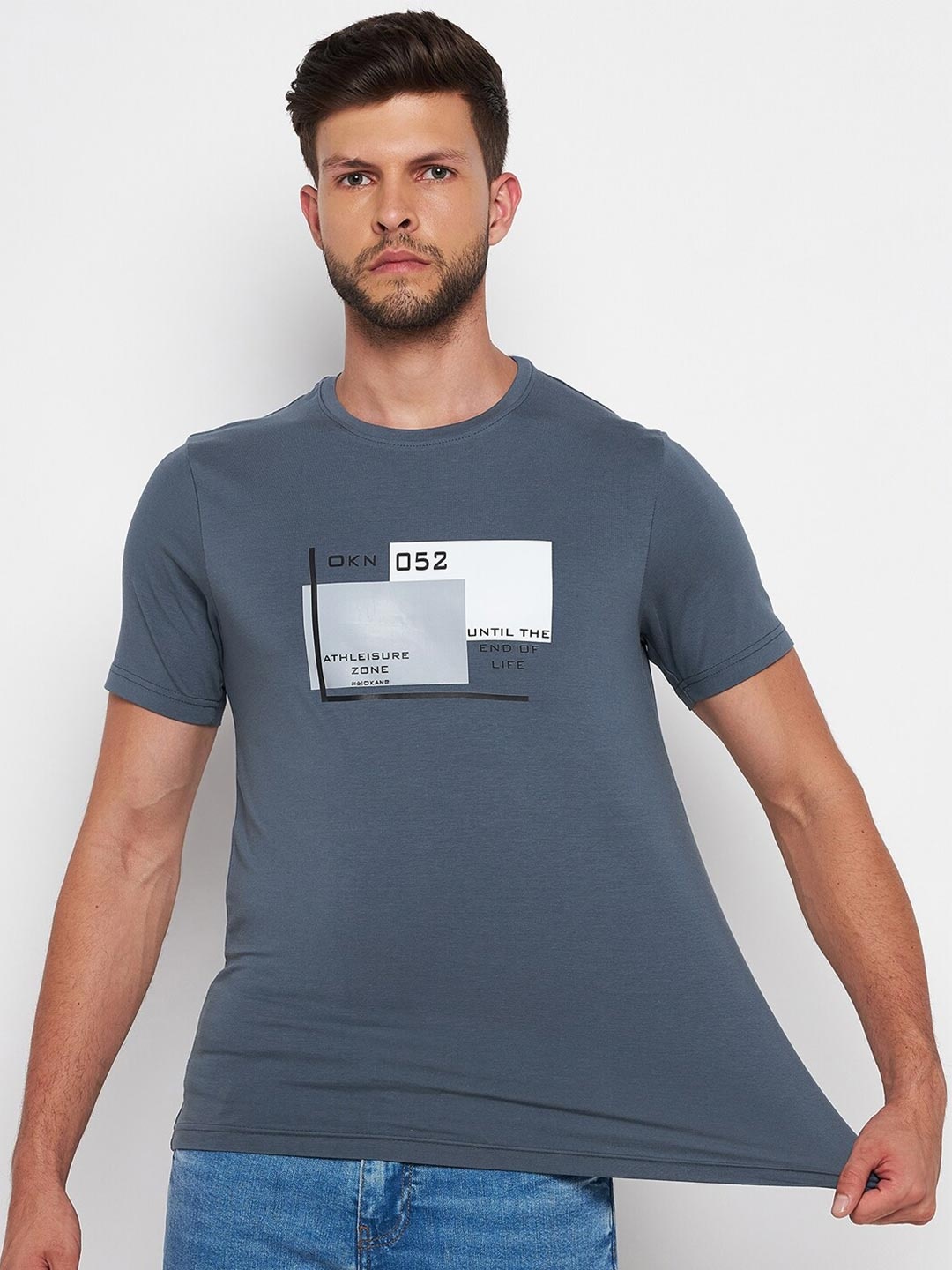 

Okane Men Blue Typography Printed T-shirt