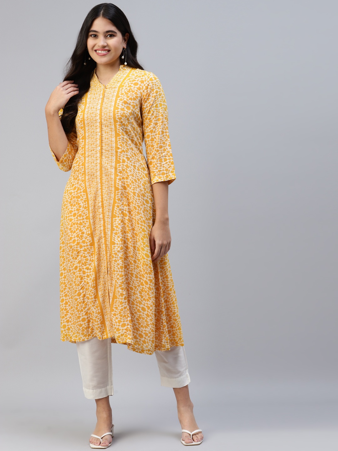 

Ayaany Women Mustard Yellow Geometric Printed Kurta