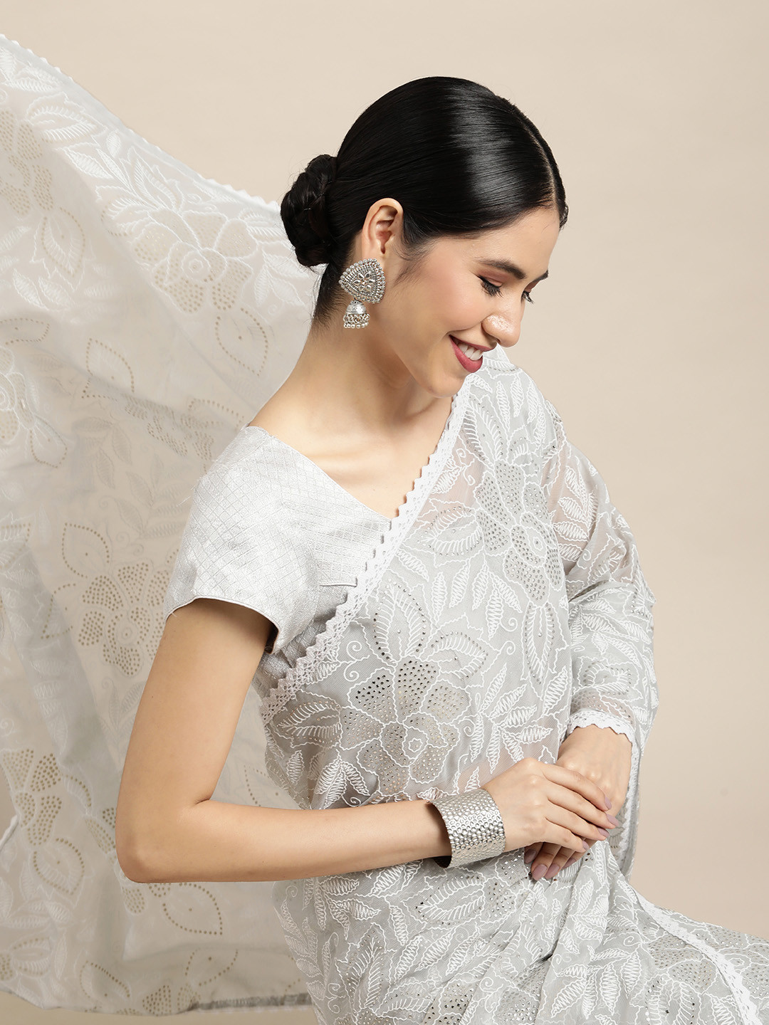 

VASTRANAND White Floral Embellished Saree
